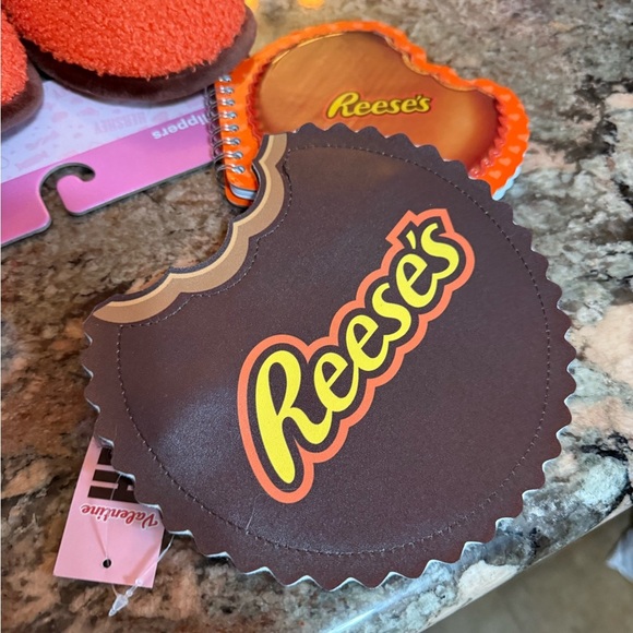 Reese's Orange Slippers Sz 2/3 M Bag, Note pad, 2 pair of Socks
All Brand New - Picture 4 of 10